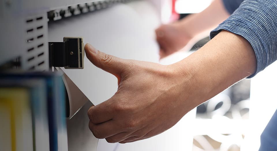 image of hand getting a paper for printing
